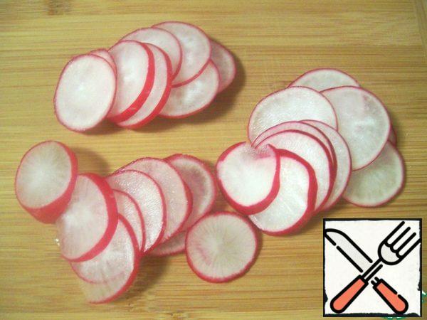 Radish cut into thin slices.
