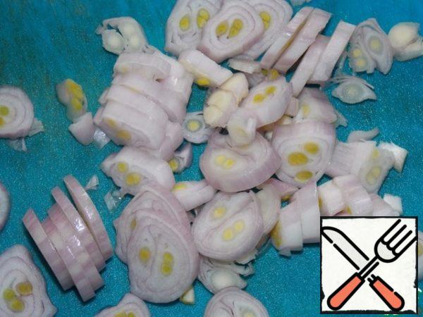 Boil the rice. Chop the onion.
