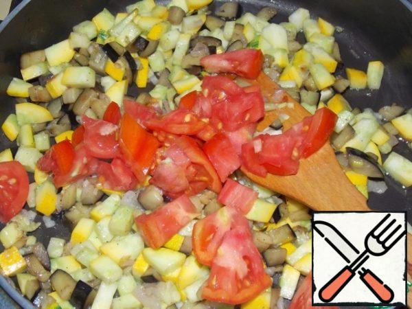 Add tomatoes and herbs. Simmer for 5 minutes.
