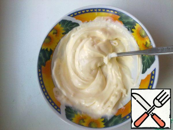 Mix mayonnaise with garlic.
