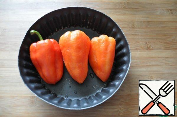 I suggest you cook an amazing snack from cottage cheese - pepper stuffed with cottage cheese.
Take the red bell pepper, wash it. Put in a mold and bake at 200 degrees for 30 minutes.