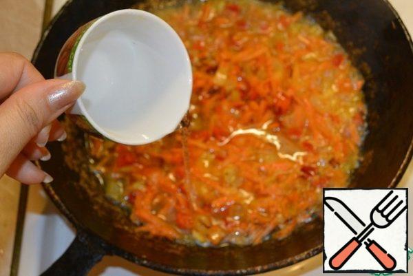 Pour in the water and bring to a boil.

