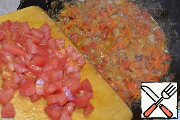 Add the cut cubes of peeled tomatoes.