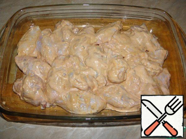 Put the wings in a deep baking tray or baking dish (I smeared a little oil).
