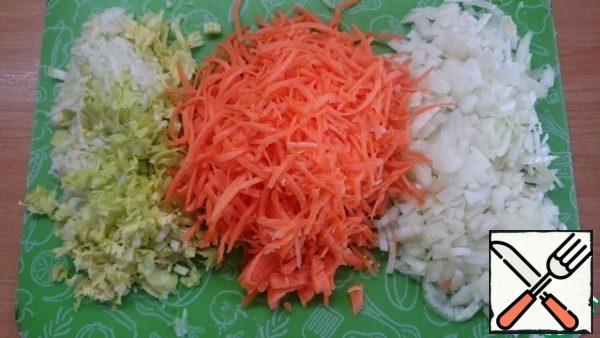 Finely chop the onion, carrot and celery.
