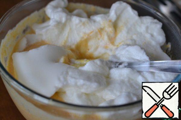 Mix both mixtures. Add the whipped whites and mix gently.
