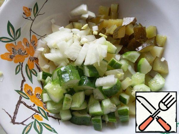 Add finely chopped onion.
I recommend using salad onions - white or red, they are more juicy and sweet than the usual peeled.

