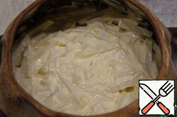 Brush the top with mayonnaise (I know many will offer cheese and mushrooms, but it's a matter of taste). Bake in the oven at 180-200*With at least an hour, and preferably longer, potatoes take a very long time to get ready. If you want it faster, you can pre-fry the potatoes until soft.