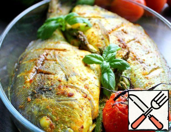 Put it in a baking dish. Usually, the oil used to lubricate the fish is enough so that it does not burn and does not stick to the bottom of the mold. But just in case, you can pre-cover the bottom with baking paper.

Next, you can add fresh vegetables to the fish, for example cherry tomatoes or green asparagus, they are also lubricated with a brush with the remnants of oil with spices.

We send it to the oven at a temperature of 190-200 degrees for 20-25 minutes (focus on your oven).

When serving, sprinkle with allspice and garnish with sprigs of fresh basil.

Enjoy your meal!