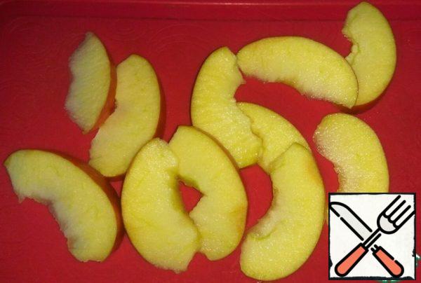 Cut the apple in half. Peel the apple if desired. Remove the core. Cut into thin slices.
