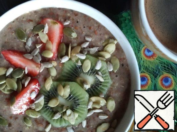 Delicious and healthy breakfast is ready! Transfer to a bowl, garnish with pieces of fruit and seeds.