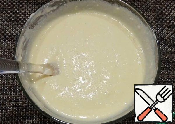 Add the semolina, mix well and leave on the table for 15 minutes so that the semolina swells.
