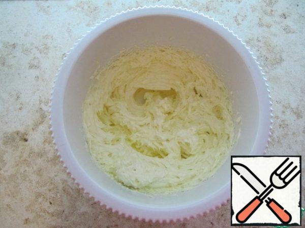 Heat the butter, but not melting consistency, beat 3-4 minutes with a mixer until fluffy, add powdered sugar, as it is easier to beat with butter, continue to beat for about 5 minutes, add 3 pieces of chicken yolk, continue to beat for about 5 minutes until a fluffy mass is formed. Add baking powder, a pinch of salt, for flavor - rum flavor or vanilla sugar.

