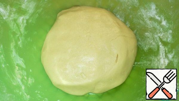 Slowly start adding flour and knead the dough.

