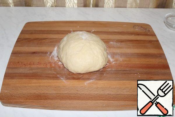 Knead the dough.
