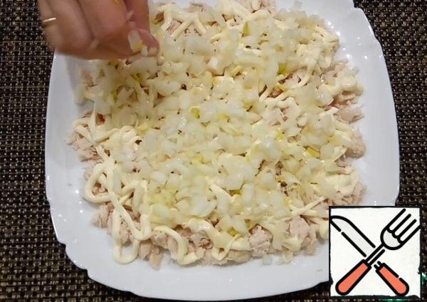 Next, lay out the pickled onion.
