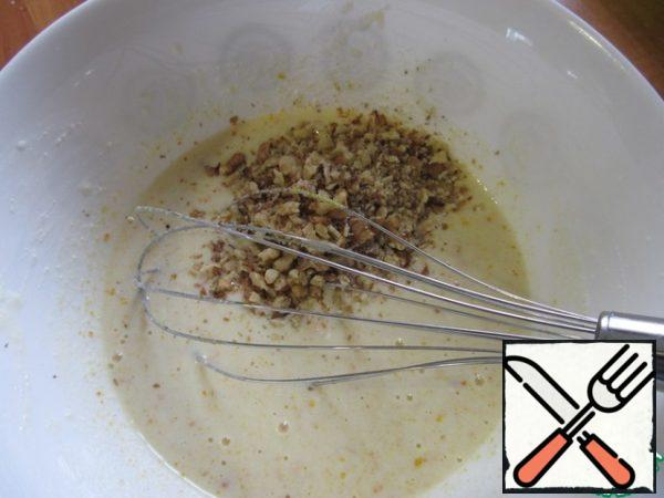 Chop the nuts and add them to a bowl.
