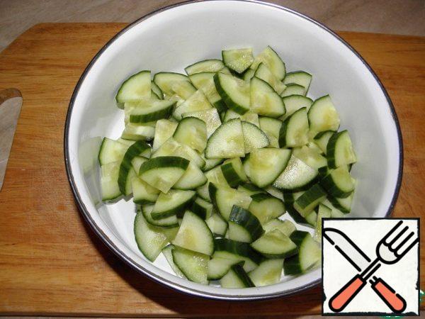 Slice cucumbers.
