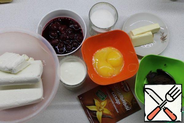 Let's make an Easter cake. Here is almost the entire set of products that we will need. You need to remove the seeds from the cherries, and put the cream in the refrigerator for now.
