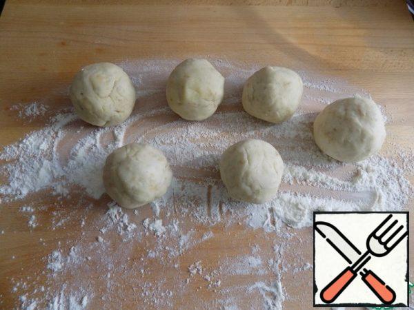 Roll into balls and leave them to rest for 10-15 minutes. The balls are approximately 5-6 cm in diameter .
