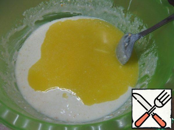 Pour in the melted warm butter.
