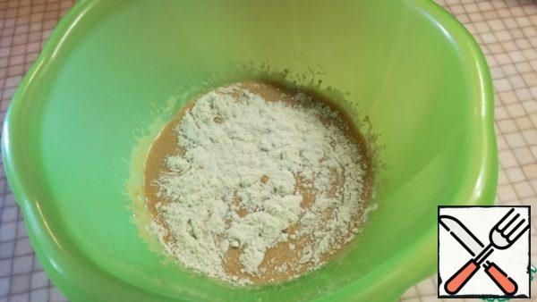 Then add a little flour (4 tablespoons), mix well. Cover and put away in a warm place for 30 minutes.
