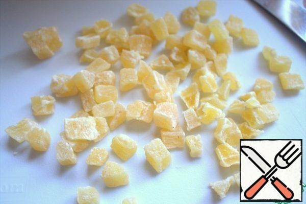 Prepare candied fruits. If large, divide in half. The color will look great in context.
