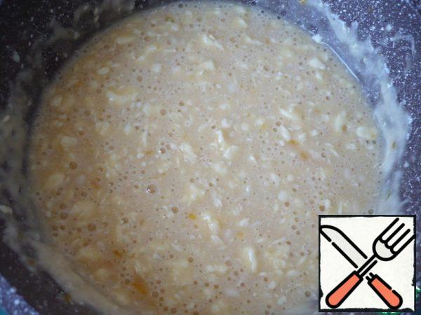 Pour the yeast mixture over all the dough and mix.
