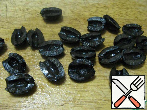 Olives, if they are large, cut in half, leave the small ones whole.
