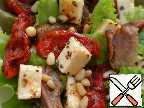 It looks so similar to our salad. It turns out juicy, crispy, a little sweet, thanks to dried tomatoes, but the presence of cheese and meat balances the taste. Try to cook this salad, you will not be disappointed, I assure you.