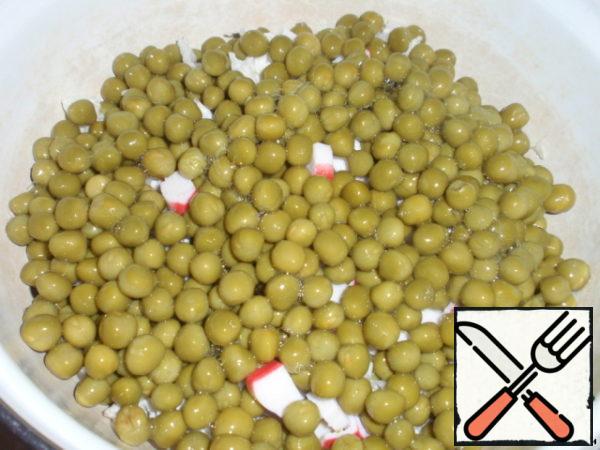 Add the peas.
