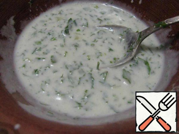 Mix yogurt with lemon juice and olive oil. Add salt, pepper and mix with chopped parsley, dill and onion.
