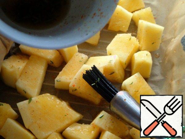 Prepare a marinade of vegetable oil and a mixture of peppers.
Cut the pumpkin into portions, put it on a baking sheet, add salt, grease with marinade and sprinkle with thyme. Place in the oven and bake at 200 °C until cooked.
