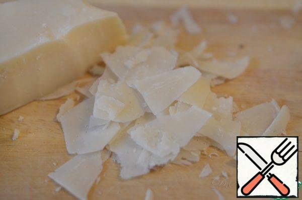 Cut the parmesan into rather large slices.
