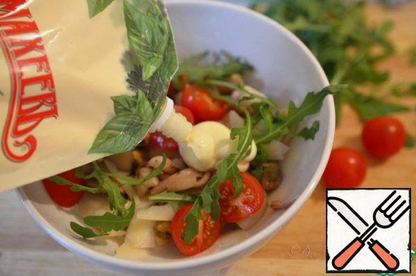 Add mayonnaise to the salad, mix well. If necessary, add salt. Leave a few clean (without mayonnaise) tomatoes, arugula and parmesan for serving, put mayonnaise on top of the salad, so the salad will have a beautiful and appetizing appearance.