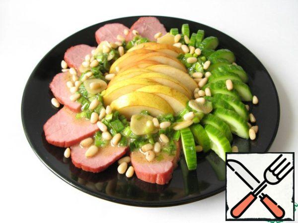 Pour the prepared sauce over the salad and let it stand in the cold for half an hour.
Before serving, sprinkle the salad with herbs and pine nuts.
Unusual and piquant!