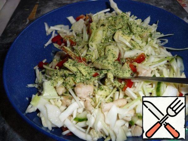 Add the salad mixture to the bowl with meat and vegetables. Mix it.
