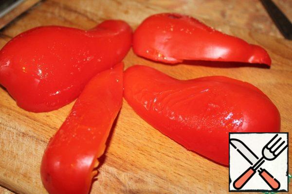 Bake the peppers in the oven for about 10-15 minutes. Skin them. Cut into cubes.
