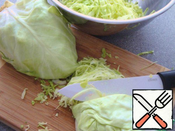 Finely chop the cabbage.