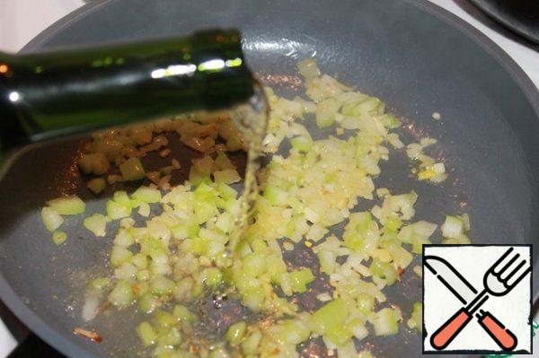Add dry white wine, evaporate.
