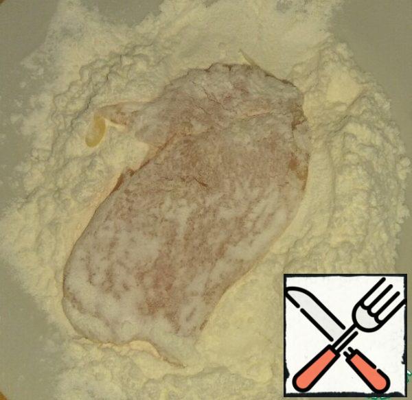Roll the chops well in flour.
