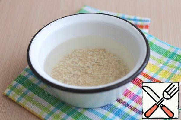 Soak pearl barley (2 tablespoons) in cold water for 1-1.5 hours. Then rinse in several waters.
