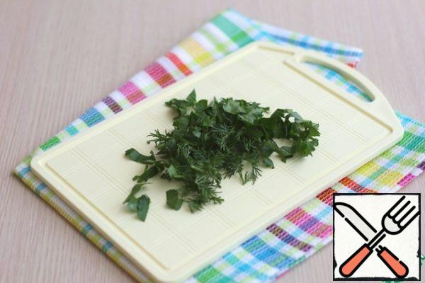 Chop the fresh herbs.
