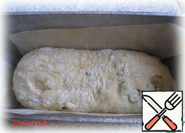 Transfer the prepared dough into a baking dish, cover with a towel and leave for 30-40 minutes for proofing.
