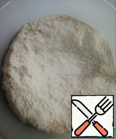 Add a pinch of salt and gradually adding flour, begin to knead the dough.