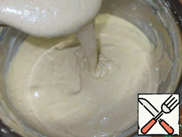 After the last portion of the flour mixture has been introduced into the dough, the dough turns out to be of this consistency... About like pancakes!
