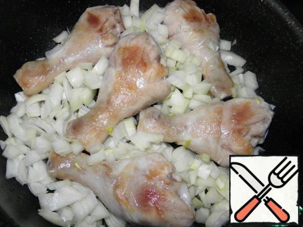 Turn it over to the other side. immediately add the chopped onion.
