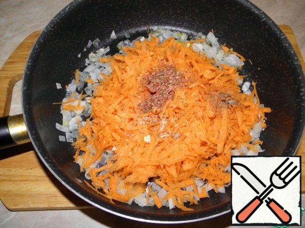 Add grated carrots, spices and sugar (about 1 tsp sugar, maybe a little more, generally depends on your tomato paste)

