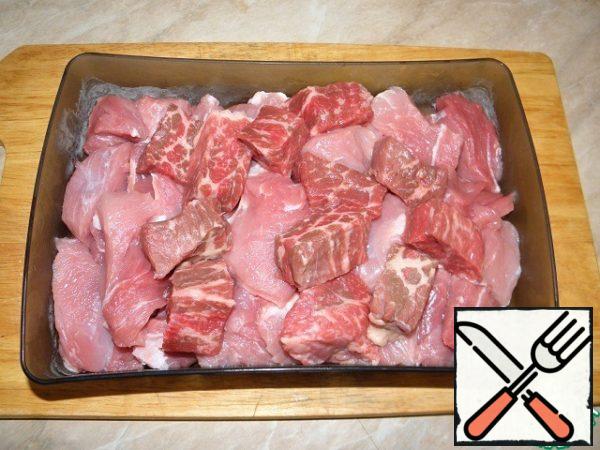 Cut the meat into cubes and be sure to freeze.