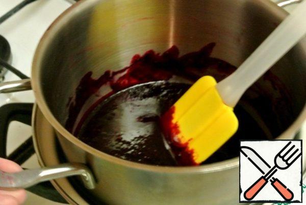 Put it in a water bath and heat it until the gelatin dissolves.
